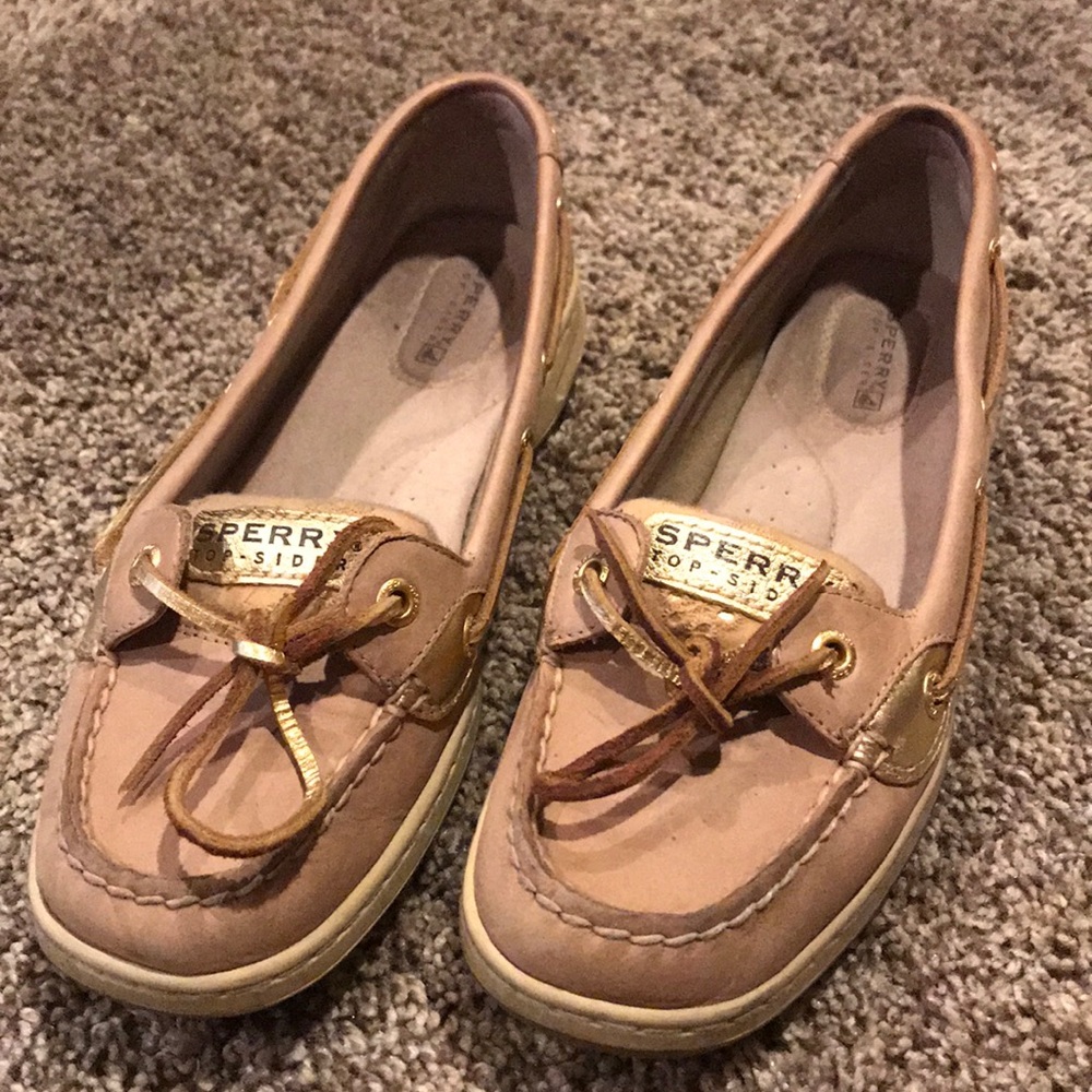Women’s gold Sperry slip ons